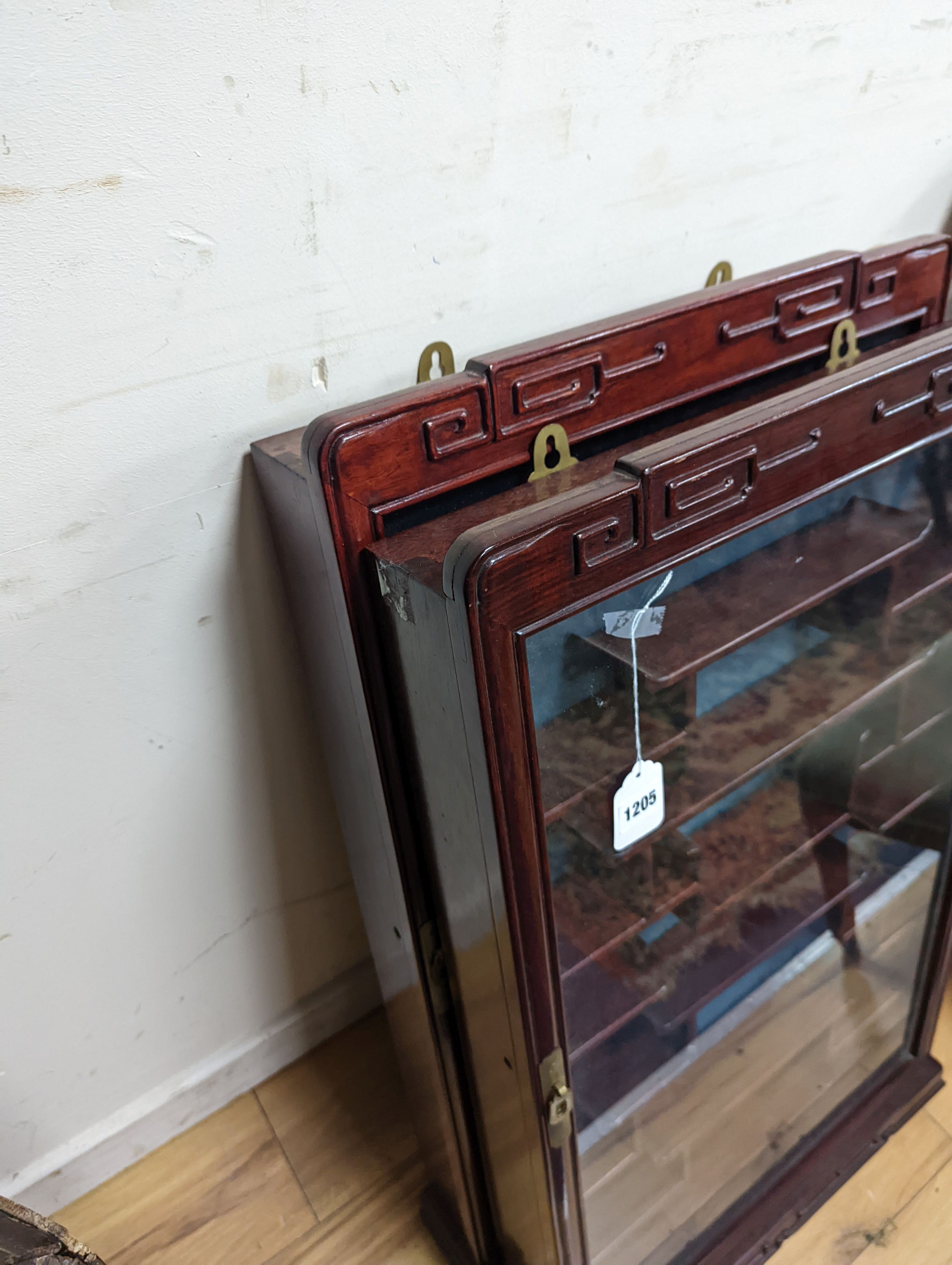 A pair of Chinese hardwood snuff bottle cabinets, width 52cm, height 83cm